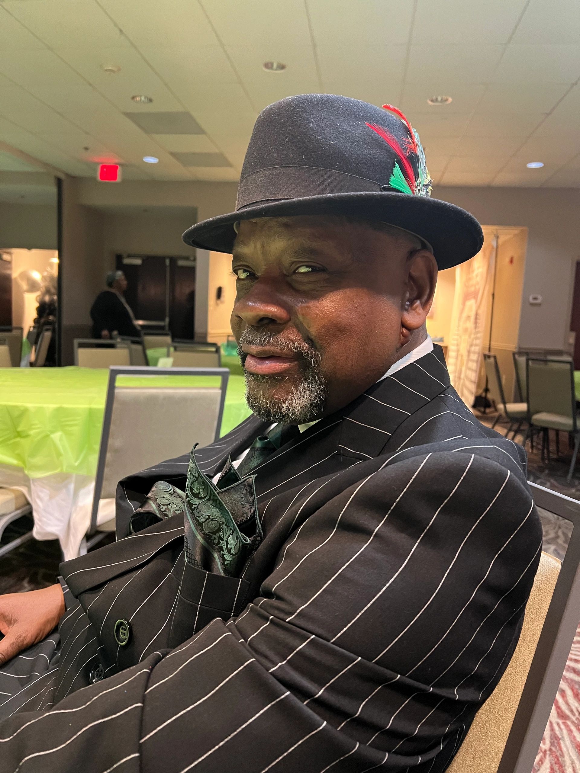 Man pinstripe suit fedora formal event